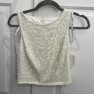 NWT ! David’s Bridal sequence tank top. Size 2 in ivory